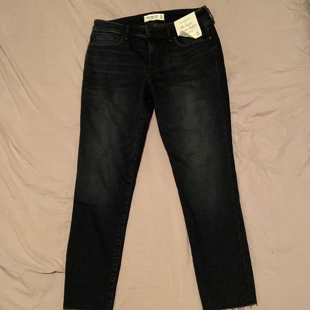 Super skinny ankle mid-rise jeans.